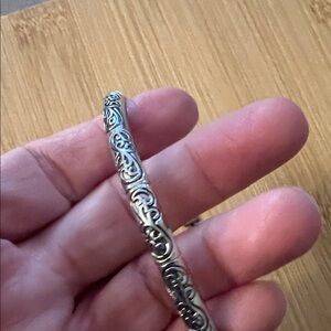 Intricate Silver Bracelet with Scroll Design